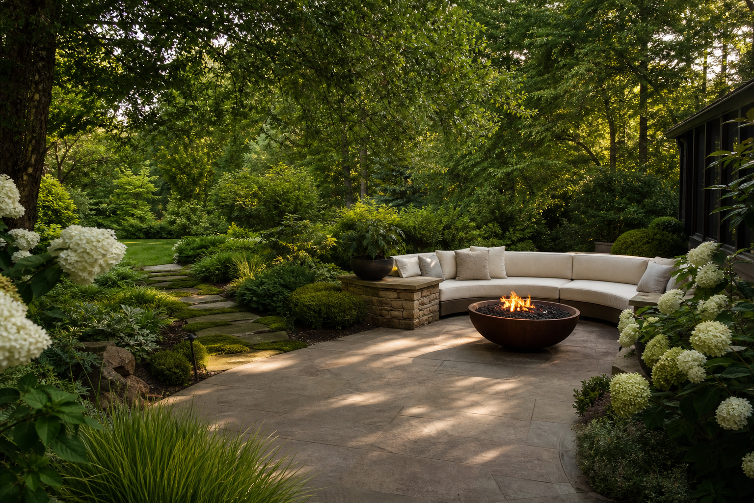 Verdant garden terrace with fire bowl