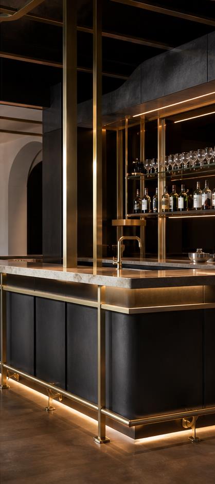 Commercial hospitality bar in brass and blackened steel